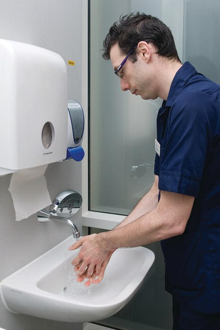 Correct position to wash hands.