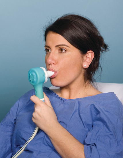 Patient using an Entonox demand valve.