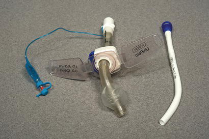 Portex® Uniperc® adjustable flange tracheostomy tube with Soft Seal® cuff and inner cannula.