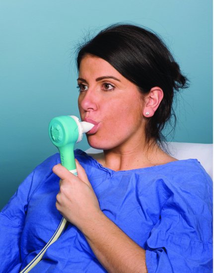 Patient using Entonox demand valve. Source: The Royal Marsden.