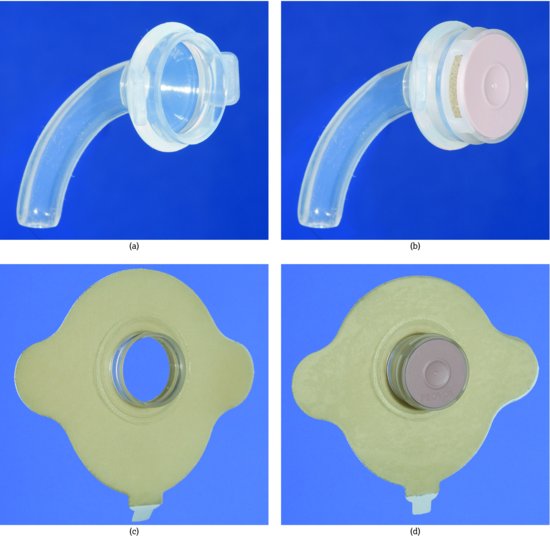 (a) Provox laryngectomy tube, (b) Provox laryngectomy tube with HME filter, (c) Provox HME baseplate, (d) Provox HME baseplate with filter in situ.